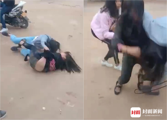 湖南宁远两女生打架无人劝 有人边笑边拍视频