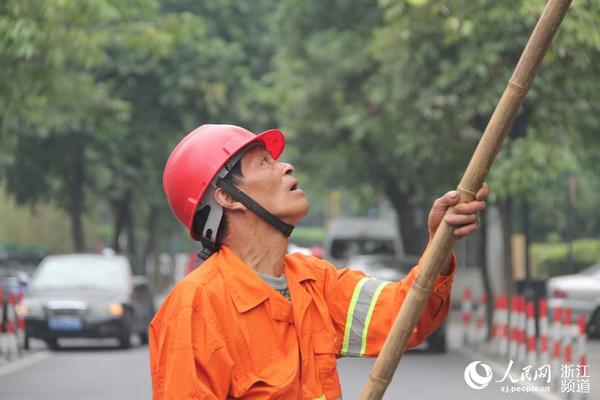 绿化工王亮文绿化城市迎八方来客