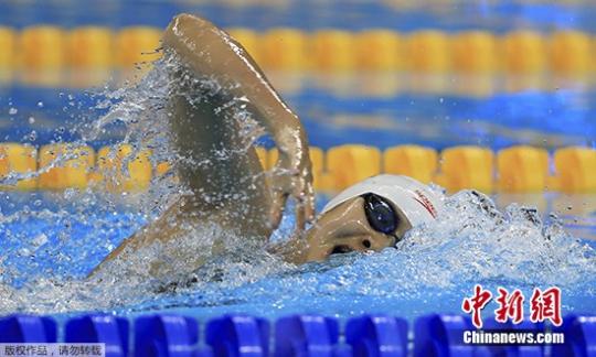 资料图：14岁小将艾衍含在比赛中。