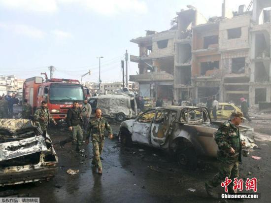 资料图：叙利亚中部城市霍姆斯市遭遇汽车炸弹袭击。