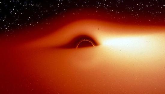 图丨一部法国电视纪录片视频中的黑洞影像，包括了多普勒失真和不对称效果（来源：JA MARCK / J。-P。LUMINET）