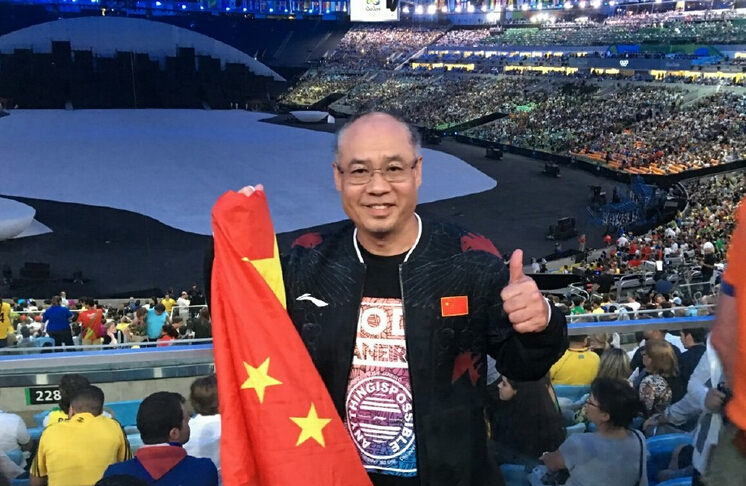 李宁出席奥运开幕式:坐着看别人点火真心轻松