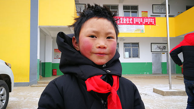 走访"冰花男孩":新年愿望是来北京旅游